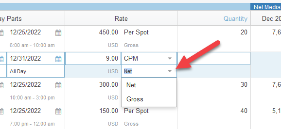 Screenshot of the line items tab in a proposal. The rate column is focused and a dropdown has been opened where it says Net, revealing Net/Gross.